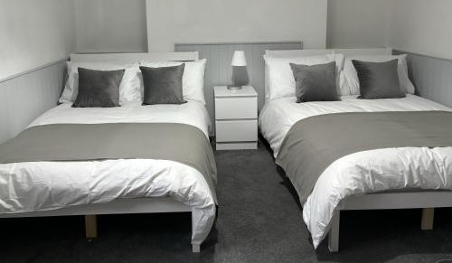 Katil atau katil-katil dalam bilik di Admiral Blake Guesthouse