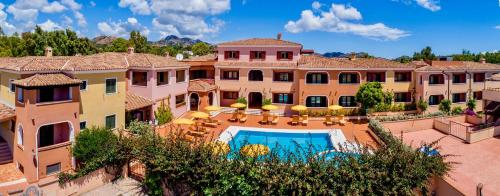 an aerial view of a mansion with a swimming pool at Residence with swimming-pool in Sos Alinos in Orosei