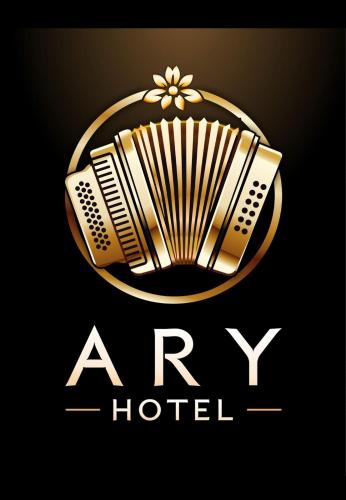 a hotel logo with an accordion on a black background at ARY Hotel in Valledupar