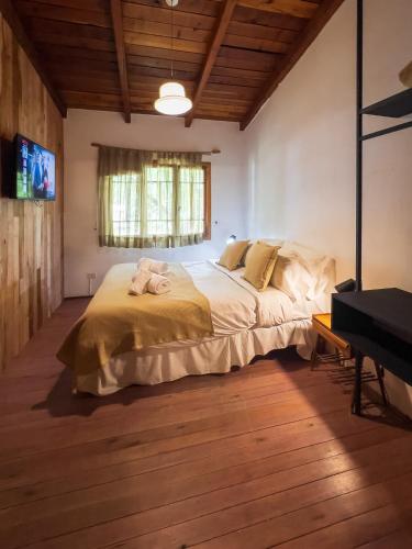 Ένα ή περισσότερα κρεβάτια σε δωμάτιο στο Wesley House Hosteria Boutique