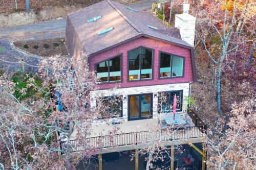 an aerial view of a house with a balcony at The Swirling Bird in Basye