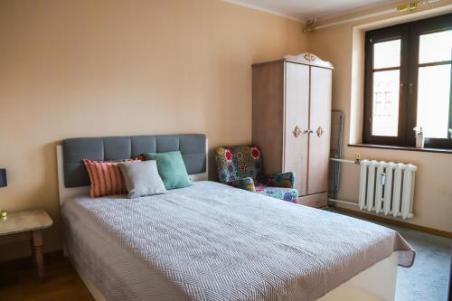 Postel nebo postele na pokoji v ubytování apartament u filipa