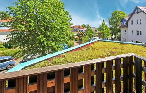 a swimming pool with grass on a balcony at Ferienwohnung Graal-Müritz in Graal