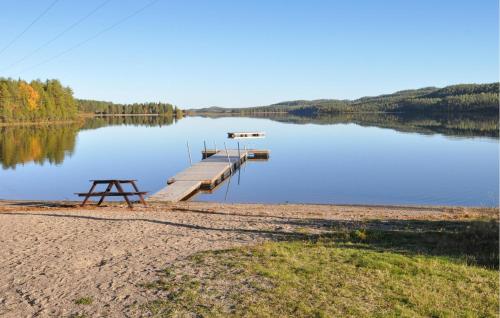 a dock on the shore of a lake at Gorgeous Home In Idre With Sauna in Idre