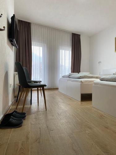Postel nebo postele na pokoji v ubytování Prenoćište Stari Grad - Old Town