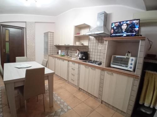Η κουζίνα ή μικρή κουζίνα στο Luna Reale Relais e Suite