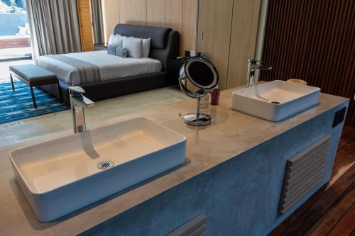 Кровать или кровати в номере Casa Carmen Xólotl