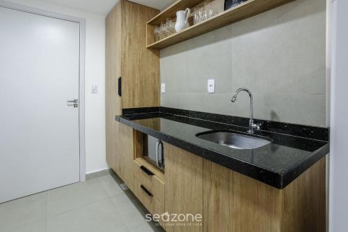 Dapur atau dapur kecil di Studio Moderno na Região Central PGO301