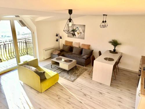Ruang duduk di Mountain View Apartament Termy Chochołowskie 5 min