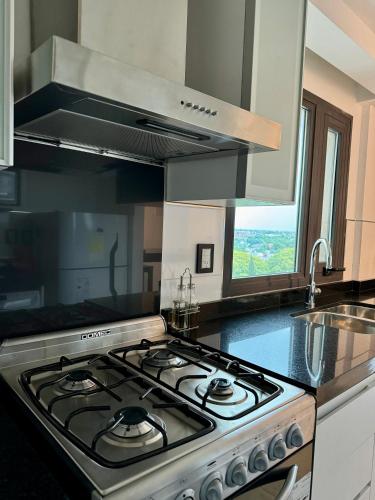 Η κουζίνα ή μικρή κουζίνα στο Edificio Guay I
