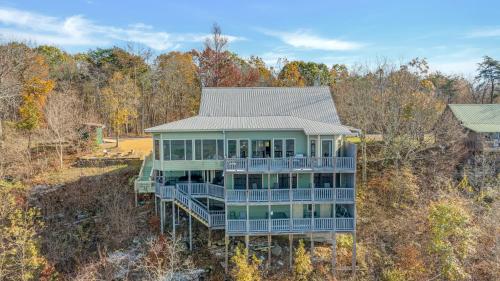 an aerial view of a large house with a deck at The Lodge in Mentone in Mentone