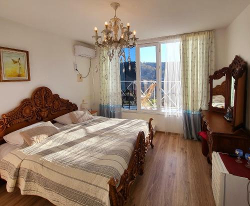 Postel nebo postele na pokoji v ubytování Sighnaghi Art Hotel