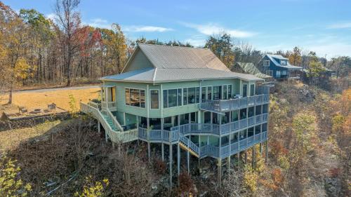 an aerial view of a house in the woods at The Lodge in Mentone in Mentone