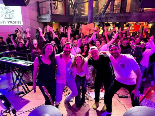 a group of people dancing in front of a crowd at Music City Hotel - The San Francisco Music Experience in San Francisco
