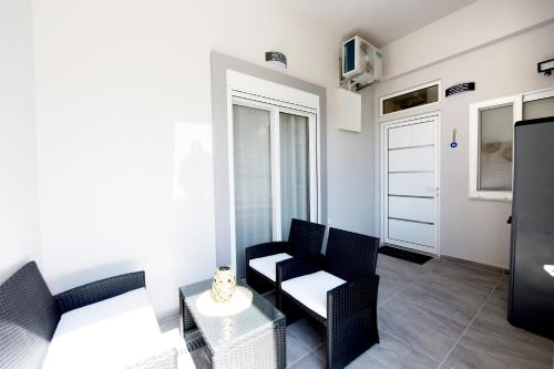 Kuchyň nebo kuchyňský kout v ubytování Square home