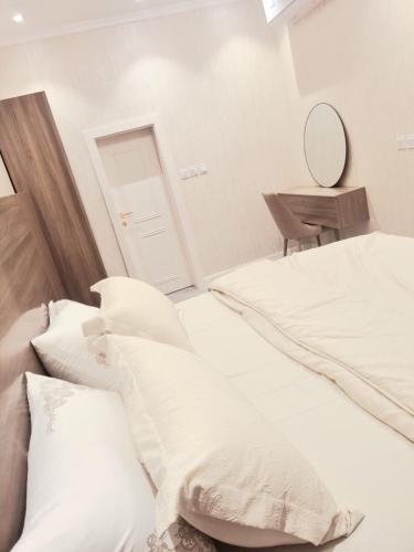 Cama ou camas em um quarto em Arena Hotel Suite