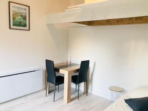 Posezení v ubytování Maisonnette T1 au calme à 1min à pied de la gare SNCF