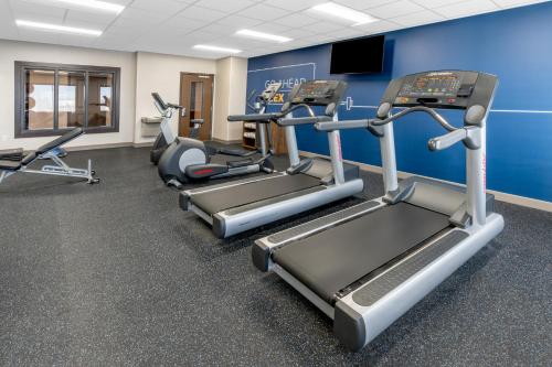 a gym with cardio equipment in a room at Holiday Inn Express Hotel & Suites Cheyenne by IHG in Cheyenne