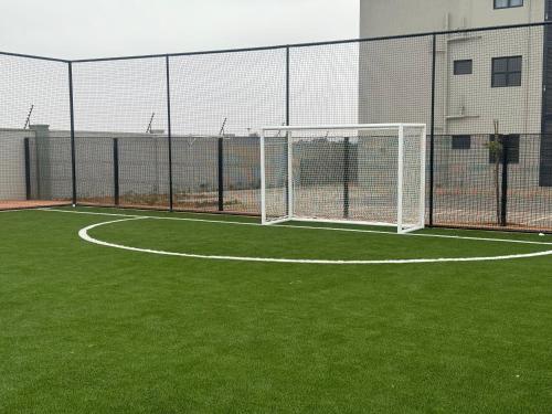 a soccer field with a net and a goal at Unit B1 Motswedi Place in Gaborone