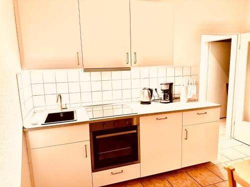 Η κουζίνα ή μικρή κουζίνα στο Wohnung Friesland EG