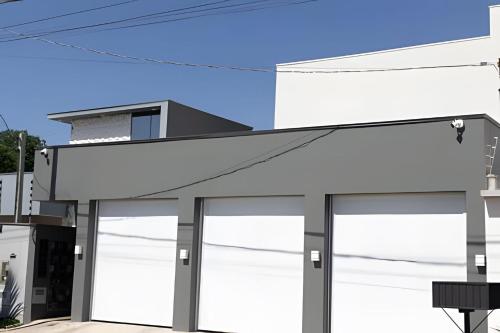 a rendering of a building with glass doors at Mini Loft Siena in Sinop