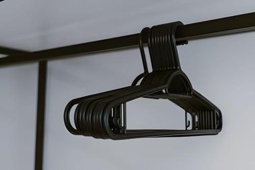 a black light fixture hanging from a window at Mini Loft Siena in Sinop