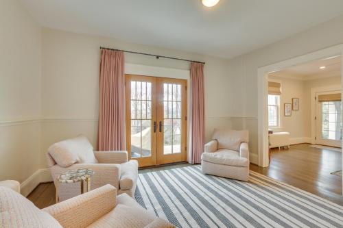 a living room with two chairs and a couch at Walk to Roanoke River Greenway Mountain-View Home in Roanoke