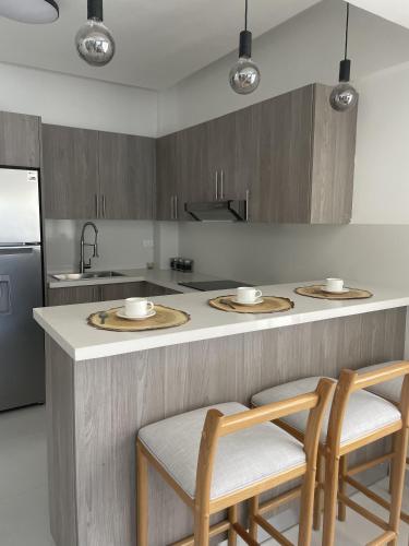 Galería fotográfica de Gold Reef 101 - Exclusiv 2 BR mit Pool, Beach Shuttle und Tiefgarage en Punta Cana