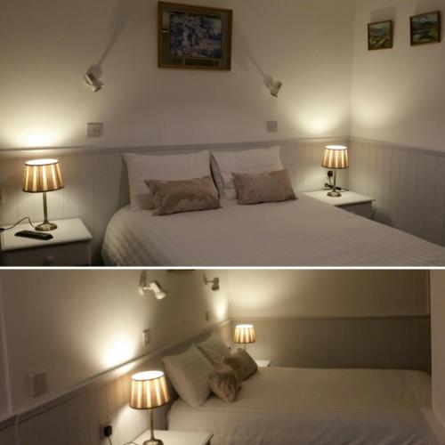 Katil atau katil-katil dalam bilik di Halfway House Hotel