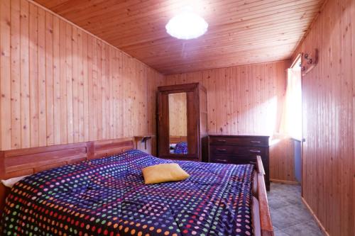 Una cama o camas en una habitación de Testa Grigia