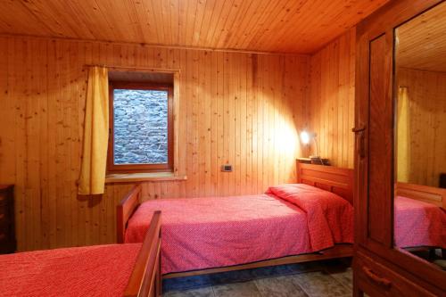 Una cama o camas en una habitación de Testa Grigia