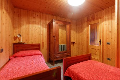 Una cama o camas en una habitación de Testa Grigia