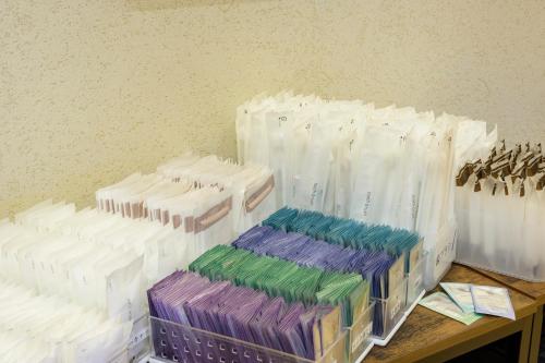 a group of plastic containers sitting on top of a table at Twin Leaves Hotel Izumo in Izumo