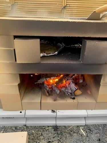 a lego table with a fire inside of it at 茶々ハウス in Fujiyoshida