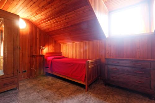 Una cama o camas en una habitación de Testa Grigia
