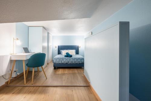 En eller flere senge i et værelse på East-Blue Appartement-Luxury