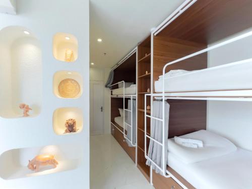 The Backpacker Hostel and spaにあるベッド