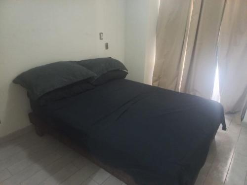 Katil atau katil-katil dalam bilik di Departamento 2 dormitorios 2 baños