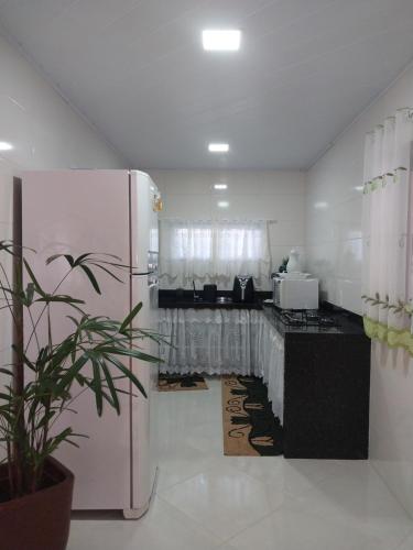 Kuchyň nebo kuchyňský kout v ubytování Chalé Recanto do Pimenta e Casa Recanto do Pimenta