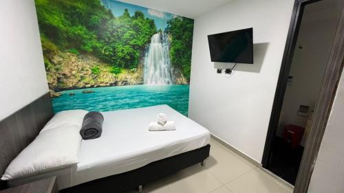 TV a/nebo společenská místnost v ubytování Hotel Jardin de Laureles Jeps