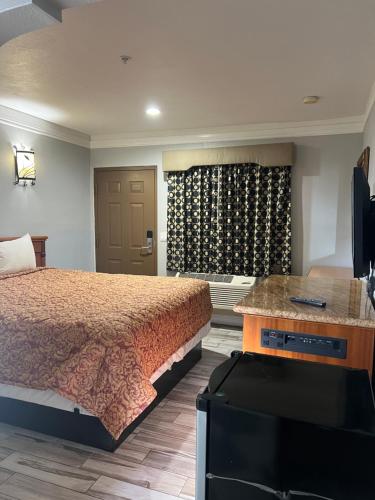 Katil atau katil-katil dalam bilik di Amber Motel