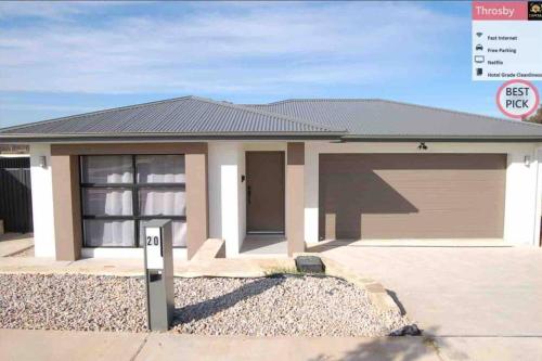 a rendering of a house with a garage at Brand New Delight Home at Throsby with 4 Bedrooms in Harrison