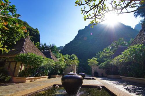 a vase sitting in the middle of a courtyard at The Banjaran Hotsprings Retreat in Ipoh