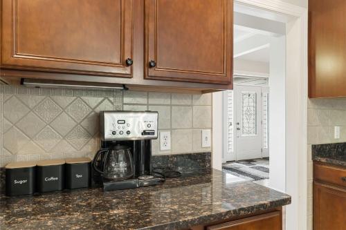 a kitchen with a coffee maker on a counter at Fairview Vista by AvantStay 10 Mins to Asheville in Fairview