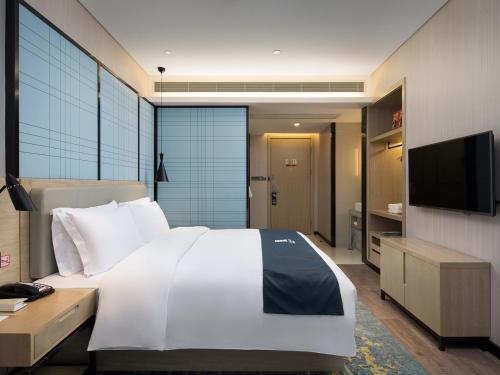 Gambar di galeri bagi Eharm Hotel Wanjiali International MALL Gaoqiao North Metro Station di Changsha
