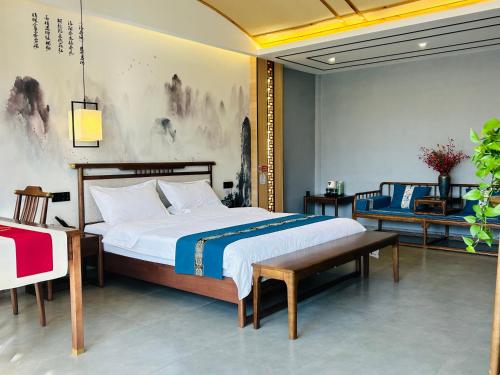 Ein Bett oder Betten in einem Zimmer der Unterkunft Qichi Waterfront B&B Hotel