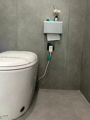 Ein Badezimmer in der Unterkunft Qichi Waterfront B&B Hotel