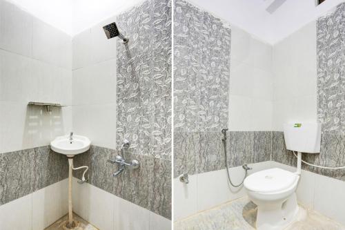 a bathroom with a toilet and a sink at Hotel O Value in Jabalpur