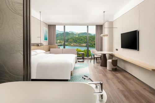 Μια τηλεόραση ή/και κέντρο ψυχαγωγίας στο Lishui Marriott Hotel