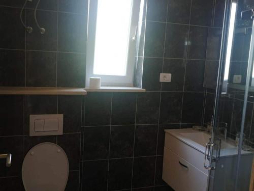 O baie la Apartments Kalajzic- Two Bedroom Apartment with Terrace A4 ST